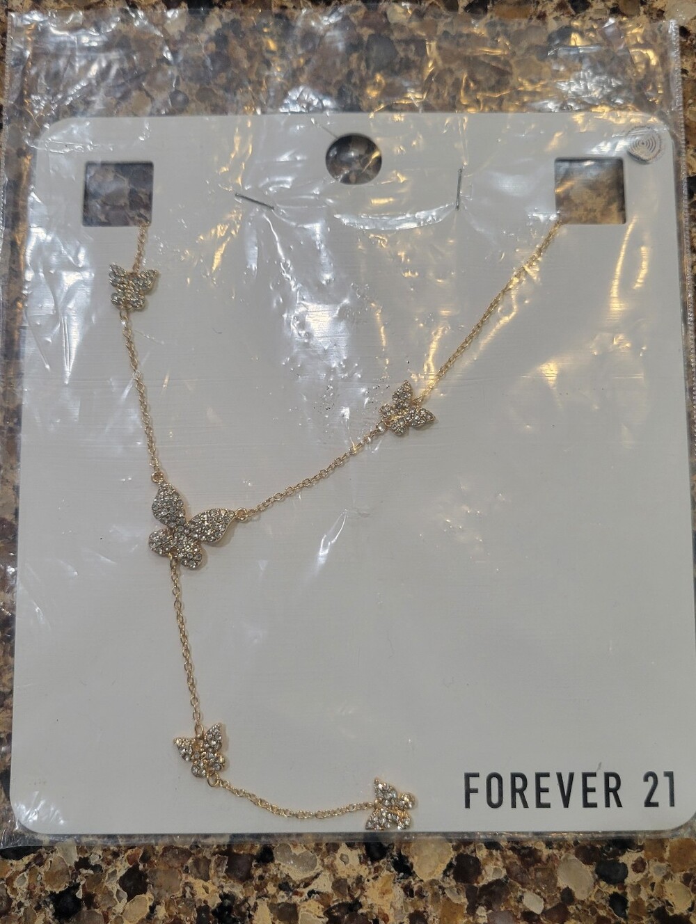BNWT Sealed gold colored butterfly lariat necklace women's/ girls new with tags